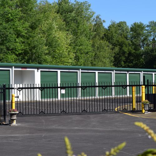 self storage units behind a pin-pad controlled security gate